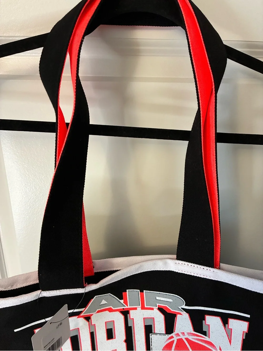New Jordan Brand Jam 84 Tote bag in black and infrared